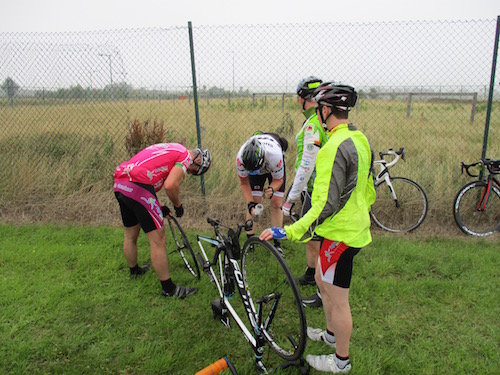Pascal Dorney gets a puncture at kilometer 20